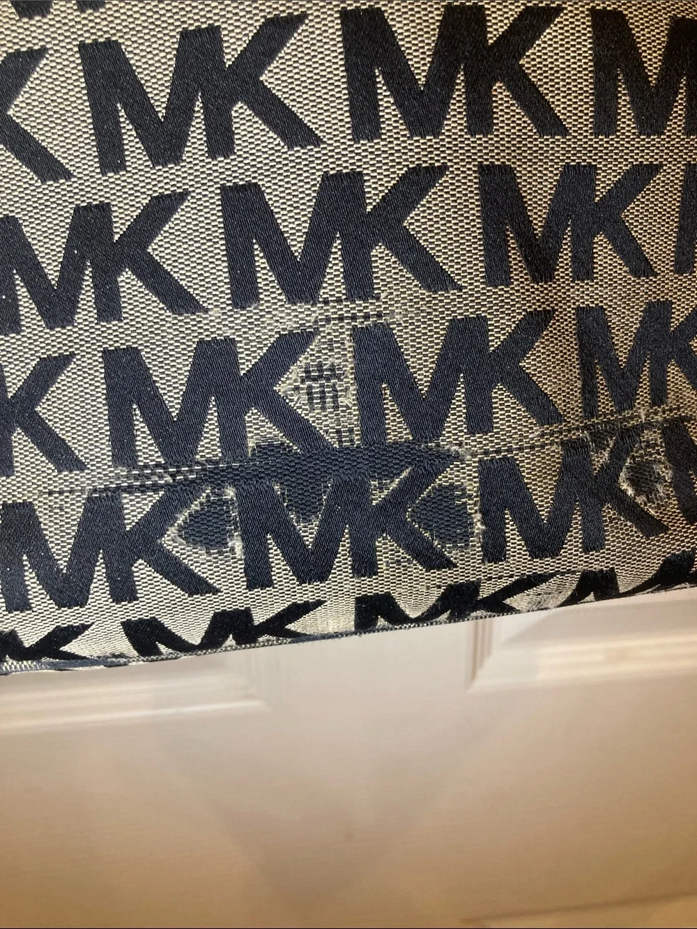 Michael Kors hardware charm see